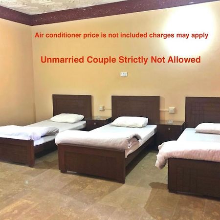 Babar House Hotel Faisalabad Bagian luar foto